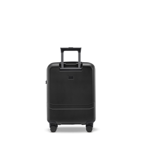 Rückseite des robusten Handgepäck-Koffers in Black aus stoßfestem Polycarbonat/ABS-Material